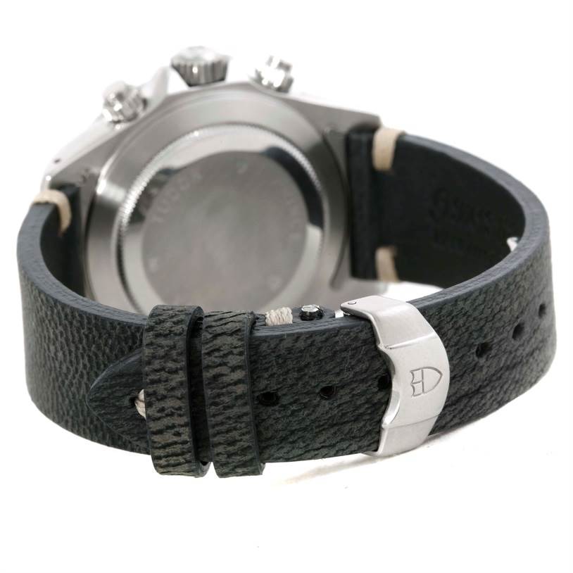 The image shows the back view of the Tudor Tiger 79280 Men's Stainless Steel White Dial 79280 Men's Stainless Steel White Dial watch, focusing on the case back, crown, and leather strap with buckle.