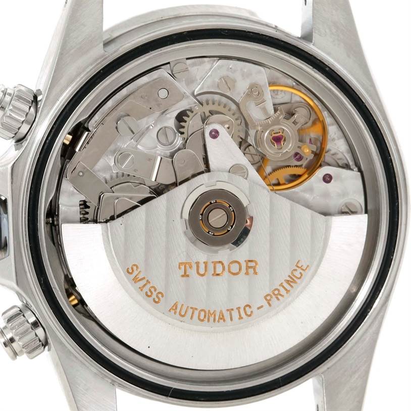 The image shows the back side of a Tudor Prince model watch, revealing its automatic movement mechanism.