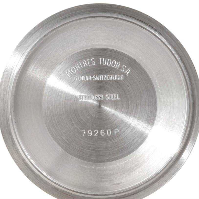 The image shows the back casing of a Tudor Prince model watch, featuring engravings of its specifications.