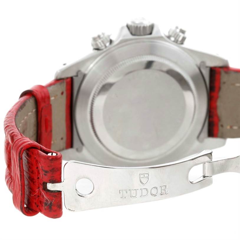 This image shows the back case and clasp of a Tudor Prince model watch with a red leather strap.