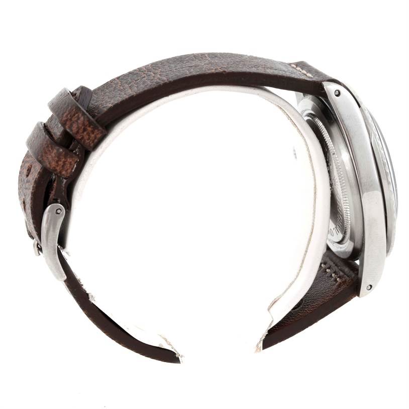 The image shows a side view of a Tudor Submariner 7016 Men's Stainless Steel Black Dial 7016 Men's Stainless Steel Black Dial watch focusing on its case and leather strap.