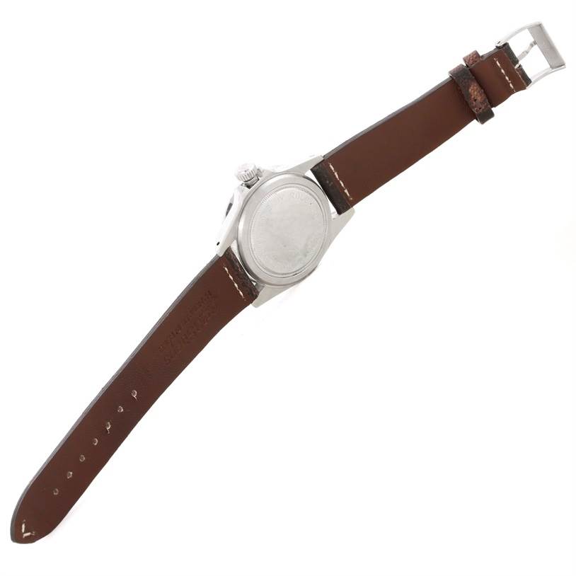 The image shows the back and strap of a Tudor Submariner 7016 Men's Stainless Steel Black Dial 7016 Men's Stainless Steel Black Dial watch at an angle that emphasizes the case back and brown leather strap.