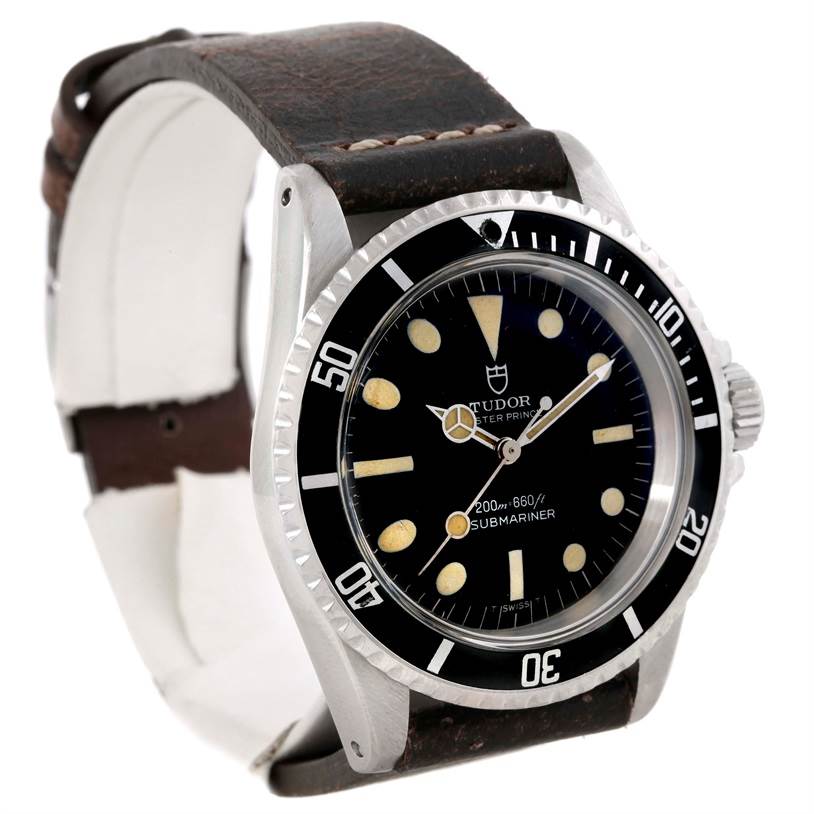 The Tudor Submariner 7016 Men's Stainless Steel Black Dial 7016 Men's Stainless Steel Black Dial watch is shown at a front three-quarter angle, displaying its face, bezel, crown, and leather strap.
