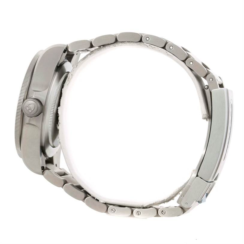 The image shows a side view of the Tudor Pelagos 25500TN Men's Titanium Black Dial 25500TN Men's Titanium Black Dial watch, highlighting the crown, case, and bracelet links.