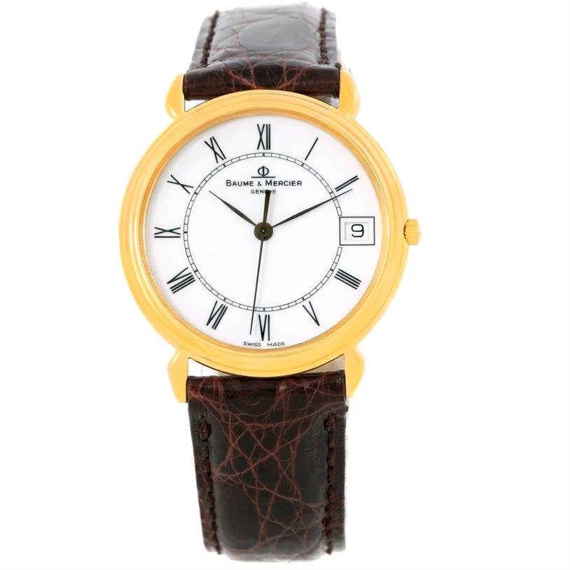 The image shows a front view of the Baume & Mercier Classima 15163 Men's Yellow Gold White Dial 15163 Men's Yellow Gold White Dial watch with a white dial, gold case, and brown leather strap.