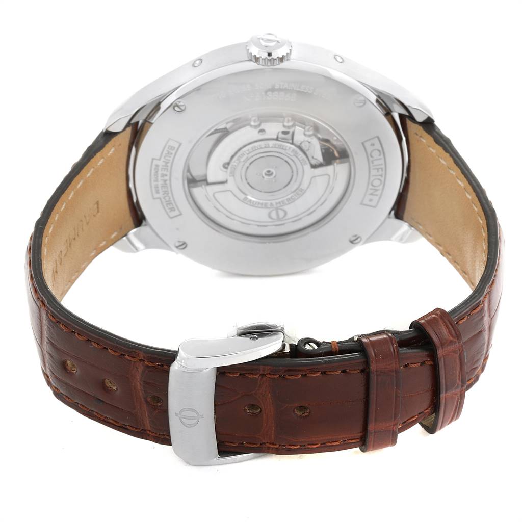 This image shows the back and strap of a Classima model by Baume & Mercier, highlighting the movement and leather band.