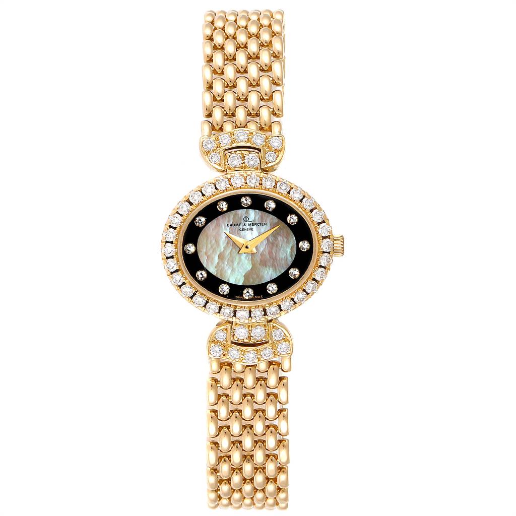 The Baume & Mercier 18523/9 Women's Yellow Gold Mother of Pearl Dial 18523/9 Women's Yellow Gold Mother of Pearl Dial Yellow Gold MOP Diamond Vintage Cocktail Ladies Watch 18523 is shown from a front view, highlighting its face, bezel, and band.