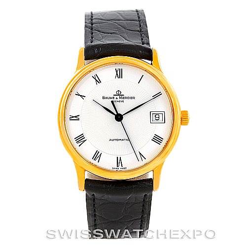 The Baume & Mercier Classima MV045075 Men's Yellow Gold White Dial MV045075 Men's Yellow Gold White Dial watch is shown from a front angle, displaying the dial, roman numerals, and leather strap.