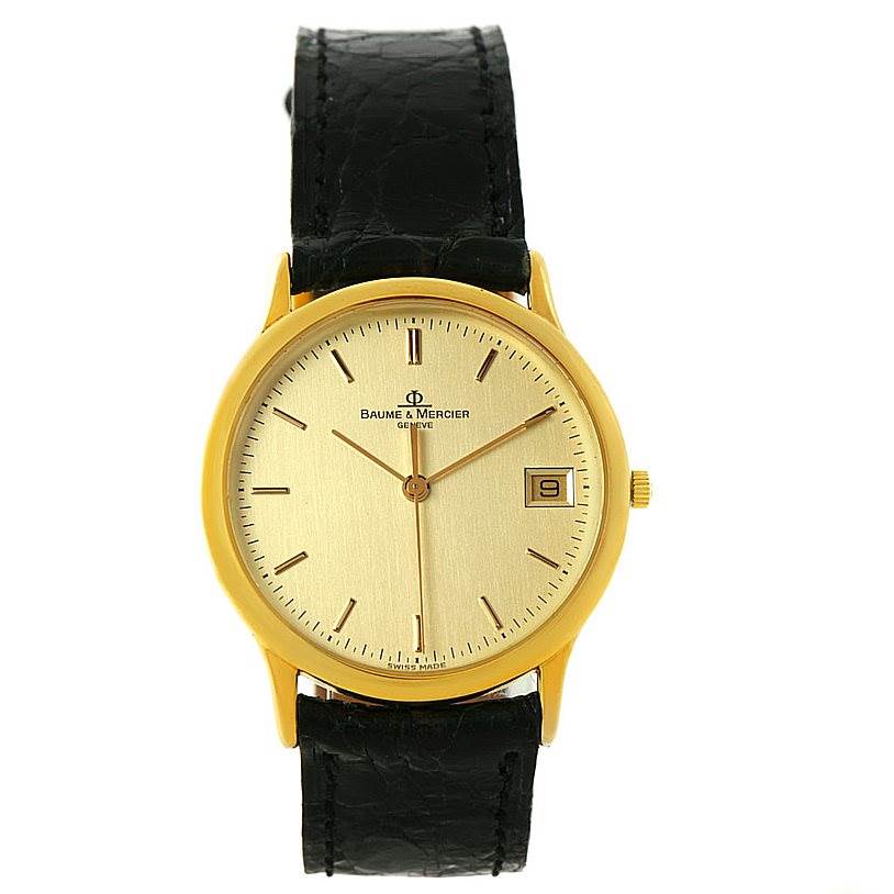 This Baume & Mercier Classima 6149 Men's Yellow Gold Champagne Dial 6149 Men's Yellow Gold Champagne Dial watch is shown from a front angle displaying its gold dial, date window, and black leather strap.