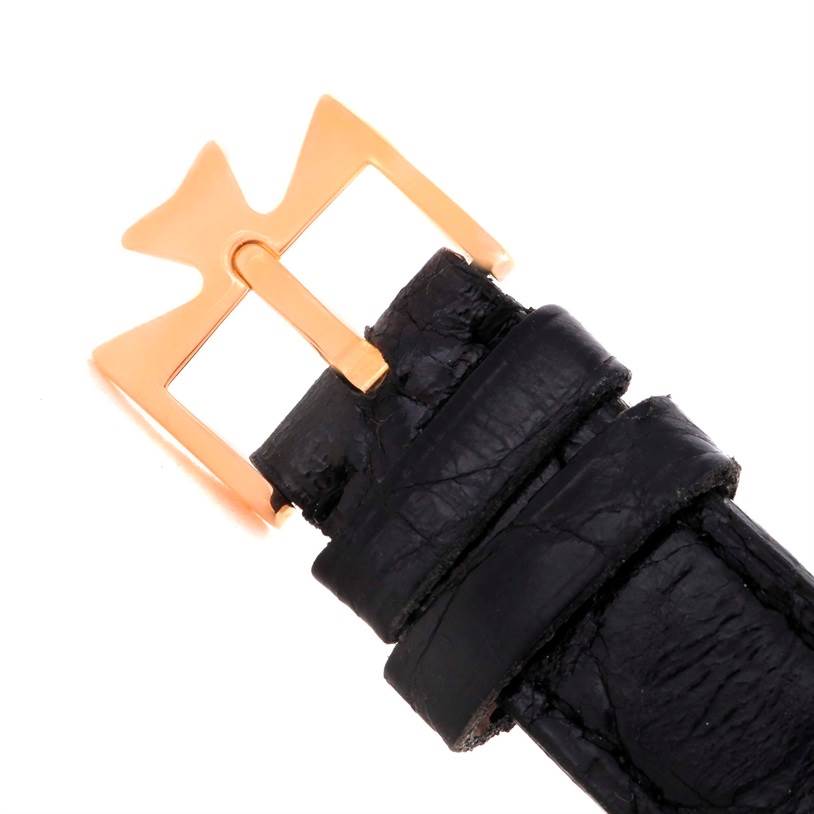 This is a close-up of the buckle on a black leather strap of a Historiques model by Vacheron Constantin.