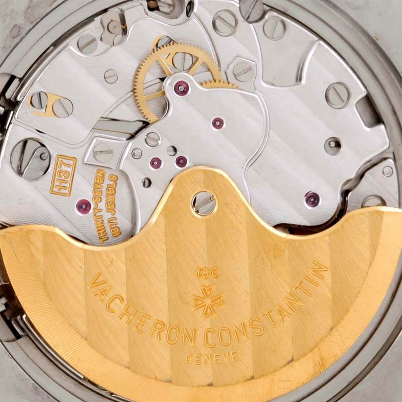 The image shows a close-up of the movement parts and engraving of a Vacheron Constantin Historiques model watch.