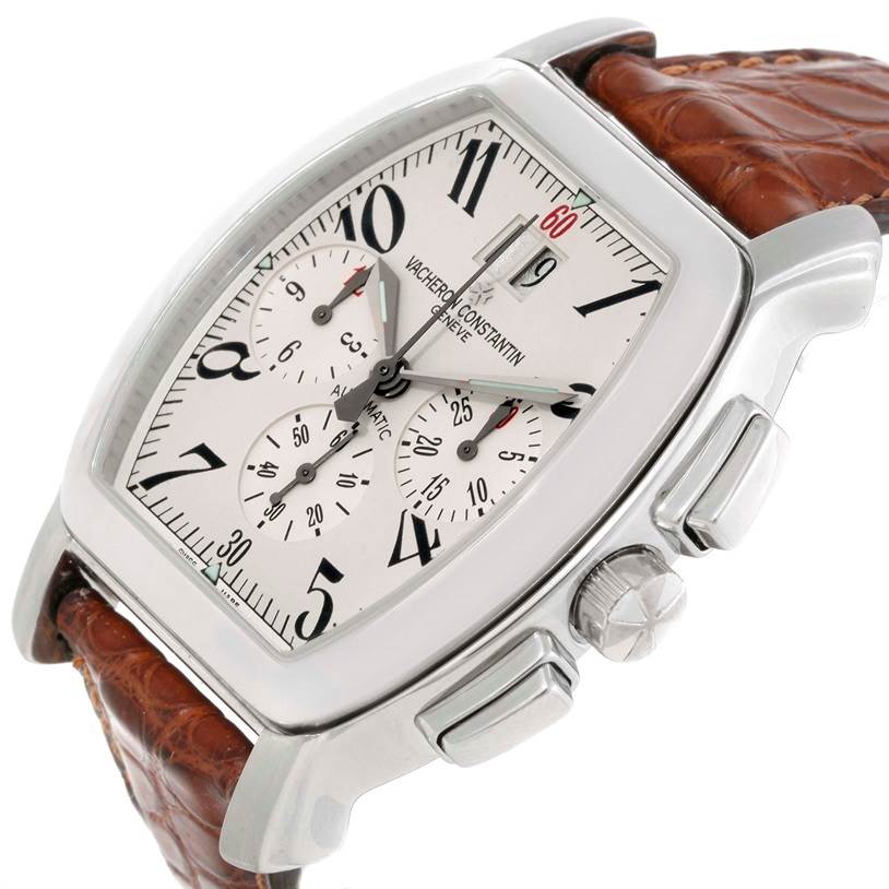 The Vacheron Constantin Historiques model watch is shown at a slight angle, displaying its face, crown, pushers, and brown leather strap.