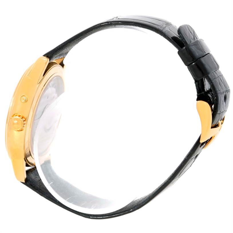 This image shows a side view of a Vacheron Constantin Patrimony 47200/1 Men's Yellow Gold Silver Dial 47200/1 Men's Yellow Gold Silver Dial watch, highlighting the gold case and black leather strap.