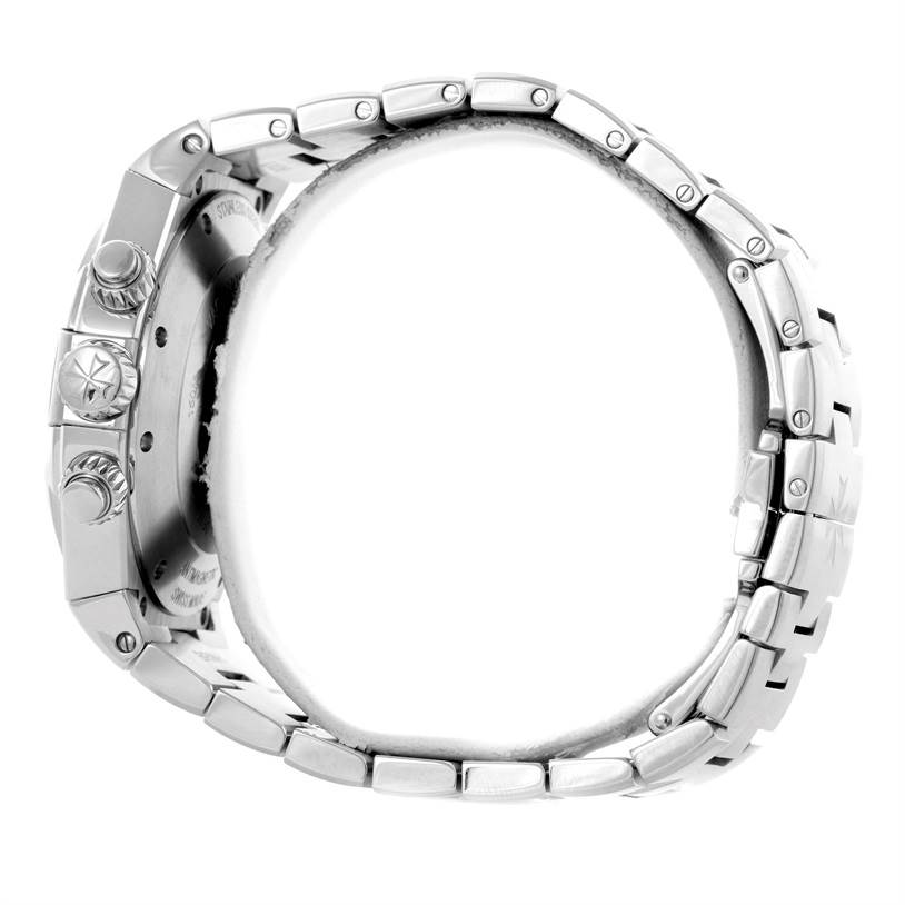 The image shows a side view of a Vacheron Constantin Overseas 49150.B01A.9097 Men's Stainless Steel Black Dial 49150.B01A.9097 Men's Stainless Steel Black Dial model watch, highlighting its case, crown, chronograph pushers, and bracelet.