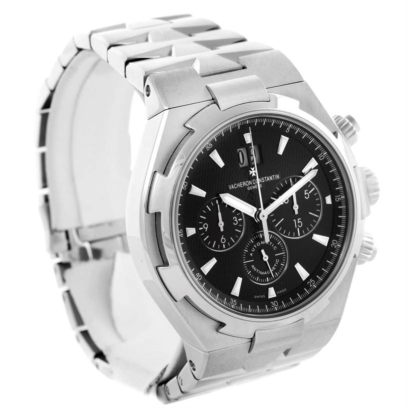 The image shows a Vacheron Constantin Overseas 49150.B01A.9097 Men's Stainless Steel Black Dial 49150.B01A.9097 Men's Stainless Steel Black Dial watch at a three-quarter angle, displaying its face, bezel, and bracelet.