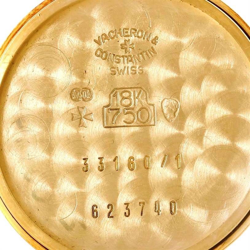 The image shows the inner case back of a Vintage Vacheron Constantin watch, featuring hallmarks and model numbers.