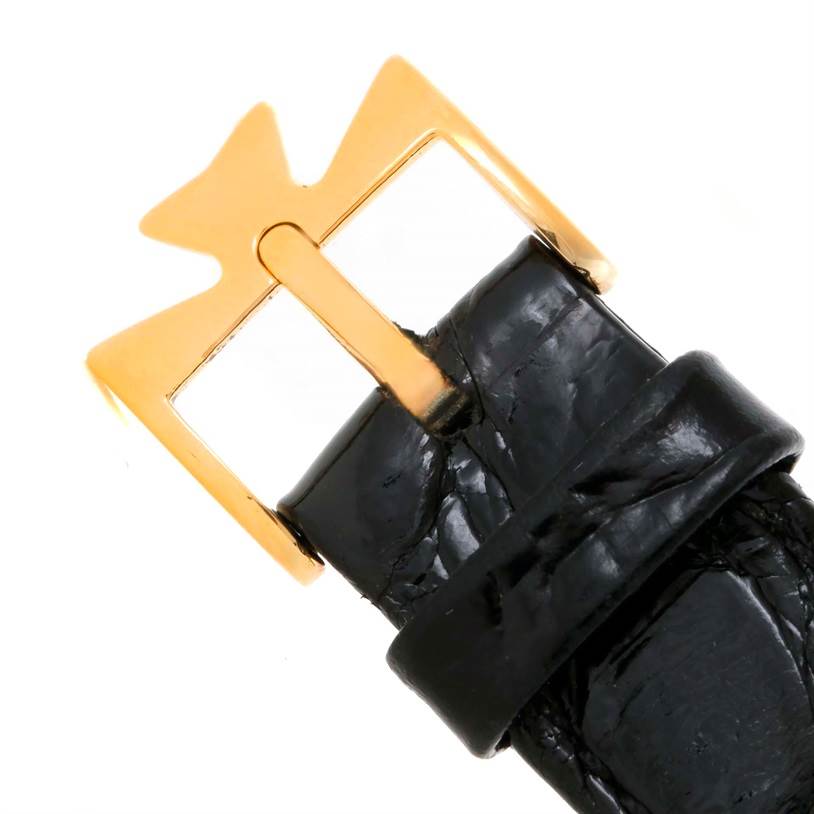 This image shows a close-up of the buckle and part of the strap of a Vintage Vacheron Constantin watch.