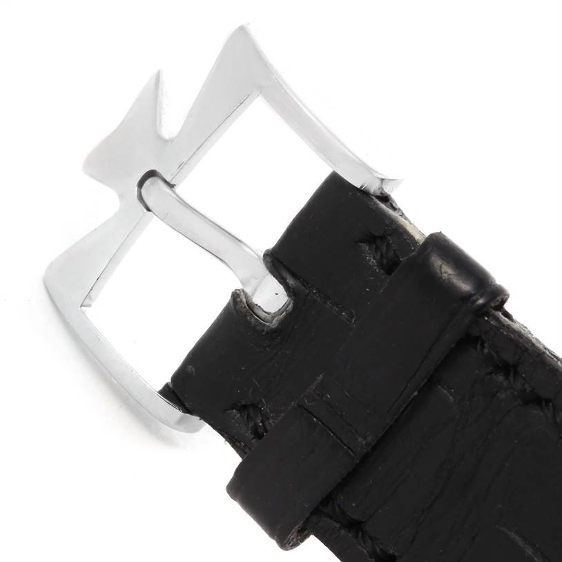 This is a close-up view of the black leather strap and silver buckle of a Vacheron Constantin Patrimony 47245 Men's White Gold Beige Dial 47245 Men's White Gold Beige Dial model watch.