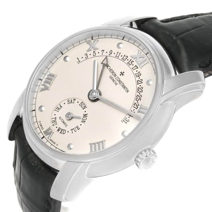 This is a Vacheron Constantin Patrimony 47245 Men's White Gold Beige Dial 47245 Men's White Gold Beige Dial watch shown at an angle highlighting the dial, crown, and strap.