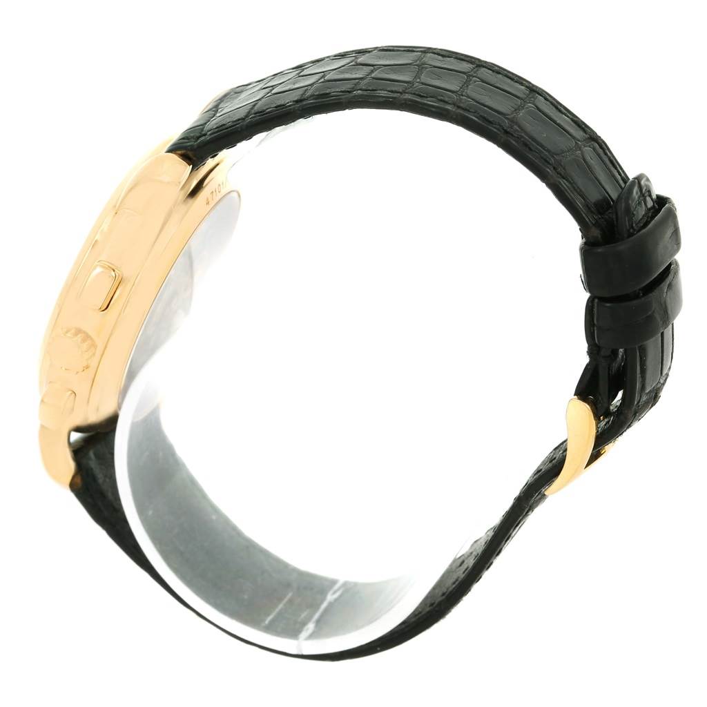 This image shows a side view of the Vacheron Constantin Historiques 47101/1 Men's Yellow Gold Silver Dial 47101/1 Men's Yellow Gold Silver Dial watch, focusing on the case and black leather strap.