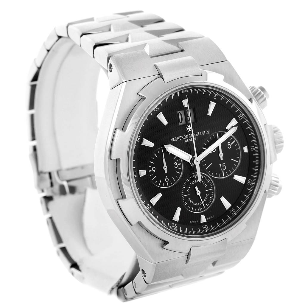 This image shows a Vacheron Constantin Overseas 49150.B01A.9097 Men's Stainless Steel Black Dial 49150.B01A.9097 Men's Stainless Steel Black Dial model watch from an angled side view, displaying its face, crown, and part of the strap.