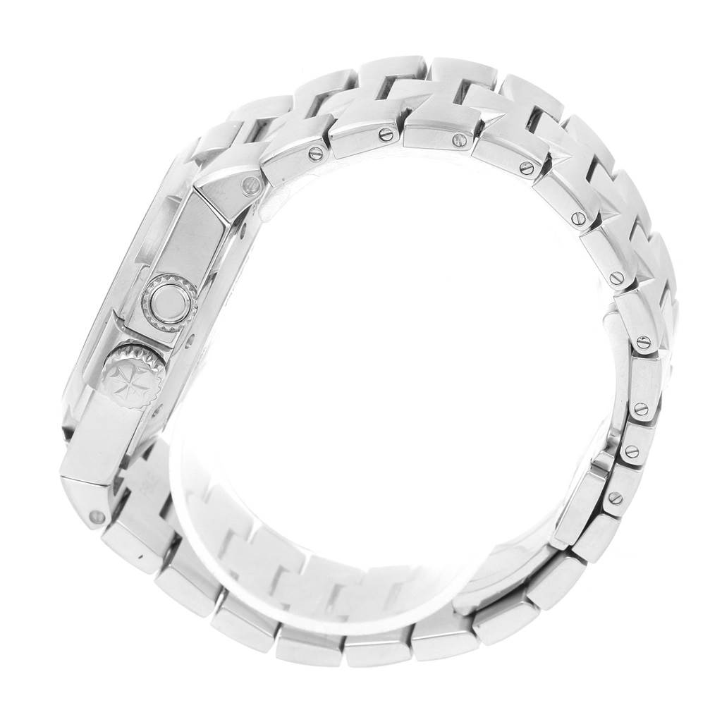 The image shows a side view of the Vacheron Constantin Overseas 47450/B01A-9226 Men's Stainless Steel Silver Dial 47450/B01A-9226 Men's Stainless Steel Silver Dial watch, focusing on the bracelet and crown.