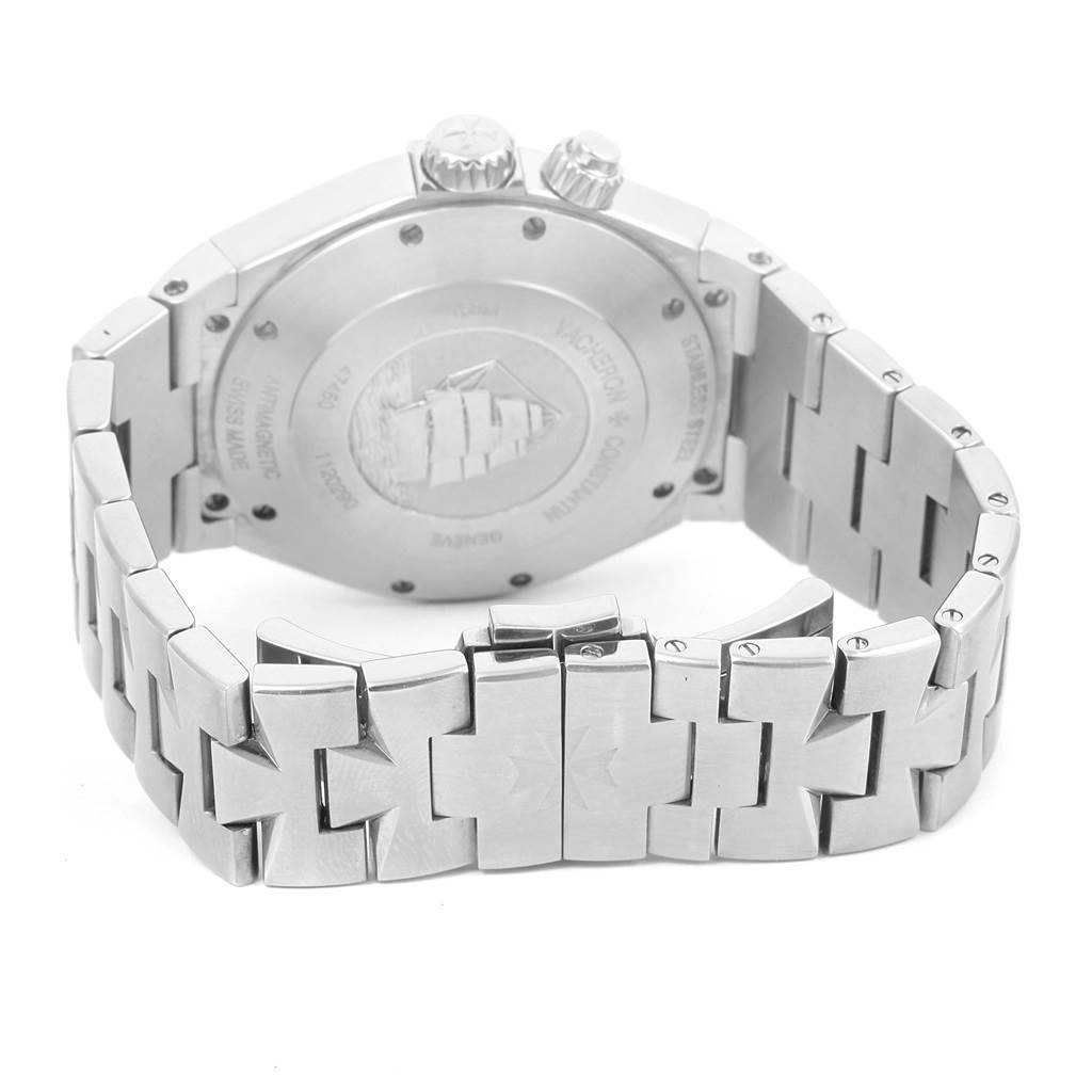 The image shows the back case and bracelet of the Vacheron Constantin Overseas 47450/B01A-9226 Men's Stainless Steel Silver Dial 47450/B01A-9226 Men's Stainless Steel Silver Dial watch, highlighting the clasp and engravings.