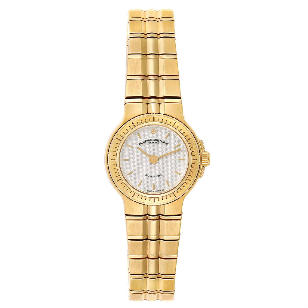 The image shows a front view of a vintage Vacheron Constantin watch with a gold bracelet and dial.