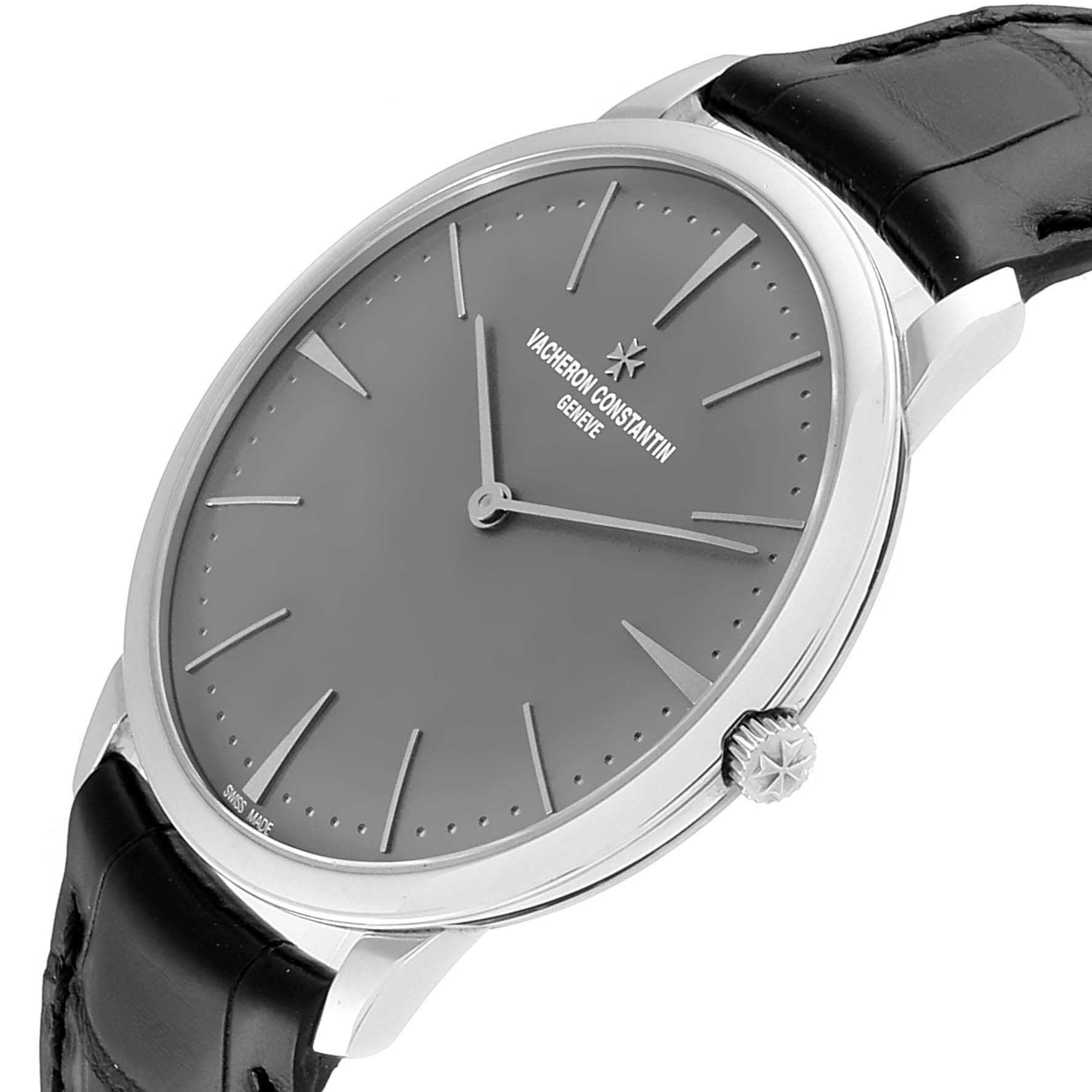 The image shows a side view of a Vacheron Constantin Patrimony 81180/000P-9539 Men's Platinum Grey Dial 81180/000P-9539 Men's Platinum Grey Dial watch, highlighting the face, crown, and black leather strap.