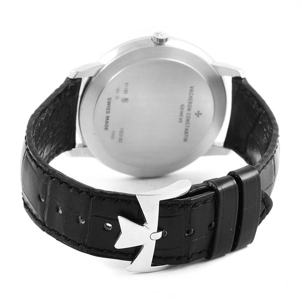 The image shows the back view of a Vacheron Constantin Patrimony 81180/000P-9539 Men's Platinum Grey Dial 81180/000P-9539 Men's Platinum Grey Dial watch, focusing on the case back and part of the leather strap.
