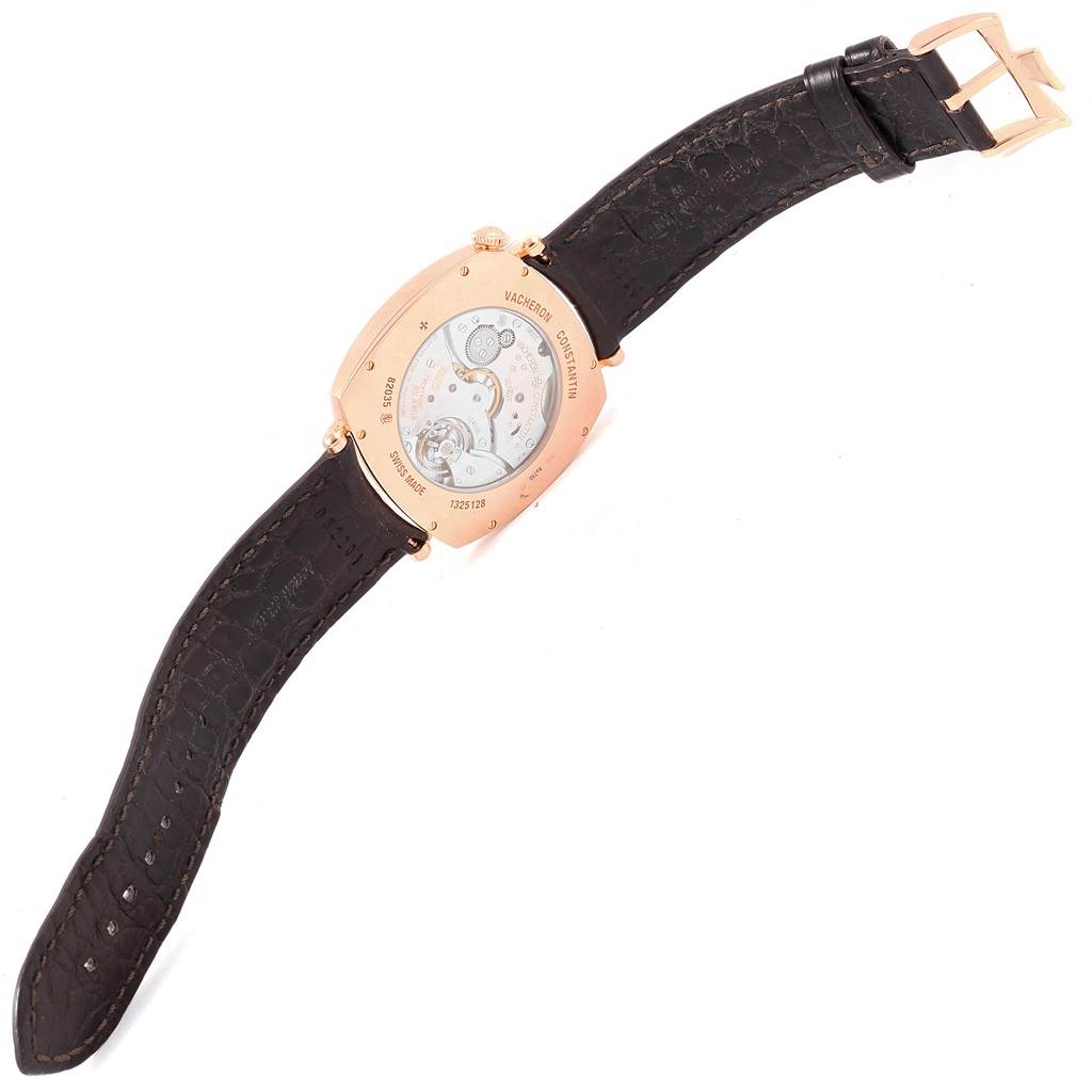 The image shows the back of a Vacheron Constantin Historiques 82035000R-9359 Men's Rose Gold Silver Dial 82035000R-9359 Men's Rose Gold Silver Dial watch, highlighting its mechanical movement and leather strap.