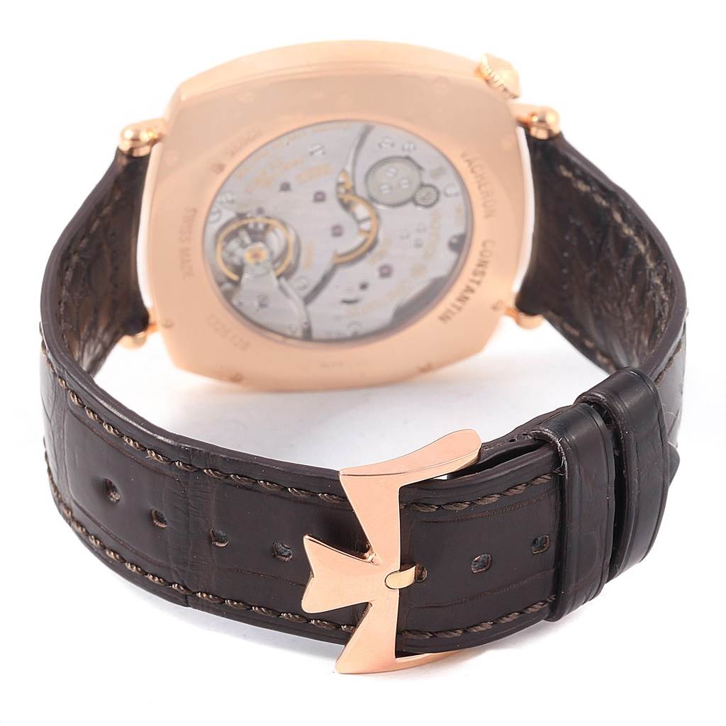 The image shows the back view and strap of a Vacheron Constantin Historiques 82035000R-9359 Men's Rose Gold Silver Dial 82035000R-9359 Men's Rose Gold Silver Dial watch, highlighting its movement and logo-stamped buckle.