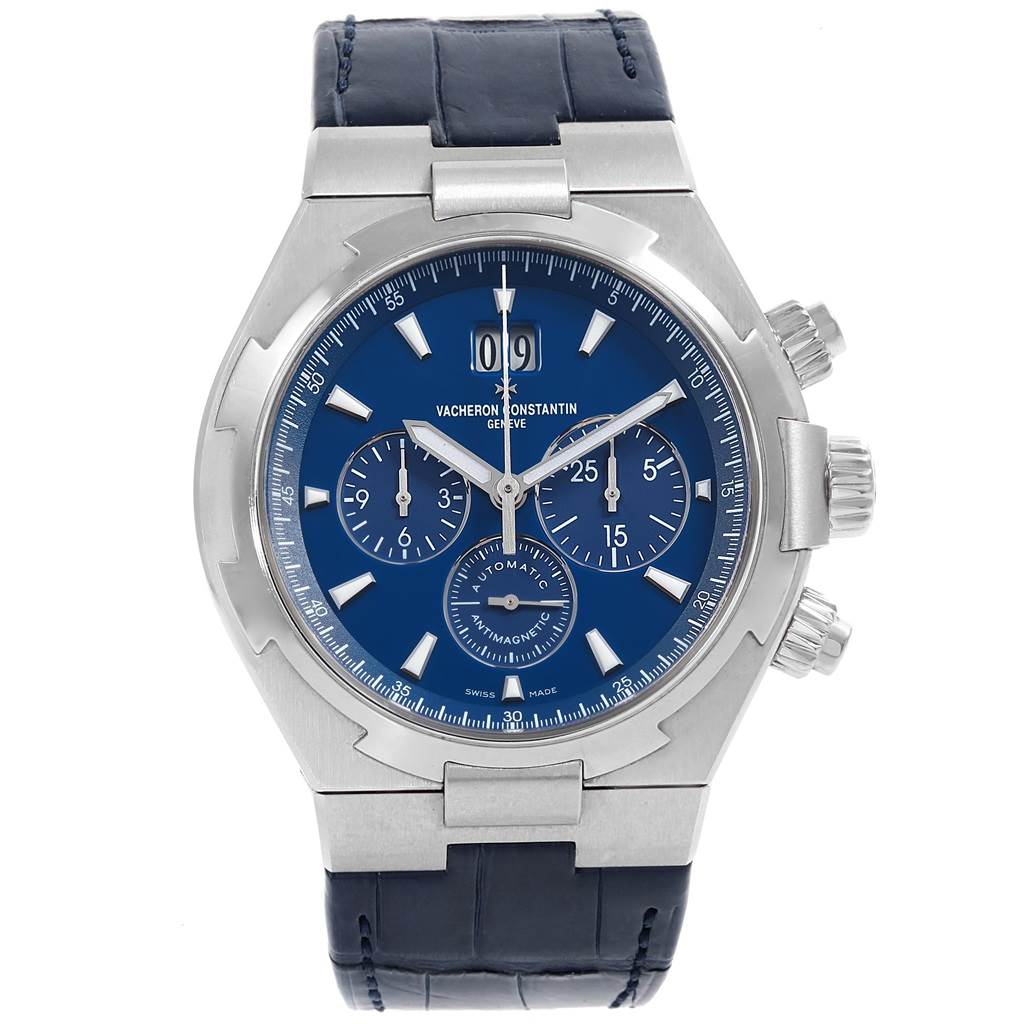 The Vacheron Constantin Overseas 49150.B01A.9097 Men's Stainless Steel Blue Dial 49150.B01A.9097 Men's Stainless Steel Blue Dial watch is shown from a front angle, displaying the dial, three subdials, crown, and leather strap.