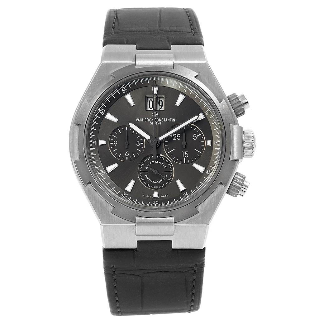 The image shows a frontal view of a Vacheron Constantin Overseas 49150/000W-9501 Men's Stainless Steel Grey Dial 49150/000W-9501 Men's Stainless Steel Grey Dial model watch, highlighting its dial, chronograph subdials, and leather strap.