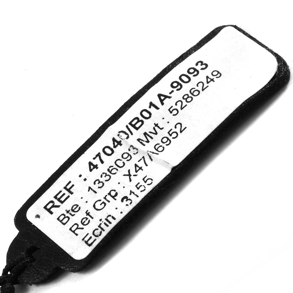 The image shows a detail tag with reference numbers for the Vacheron Constantin Overseas 47040/B01A-9093 Men's Stainless Steel Silver Dial 47040/B01A-9093 Men's Stainless Steel Silver Dial model.