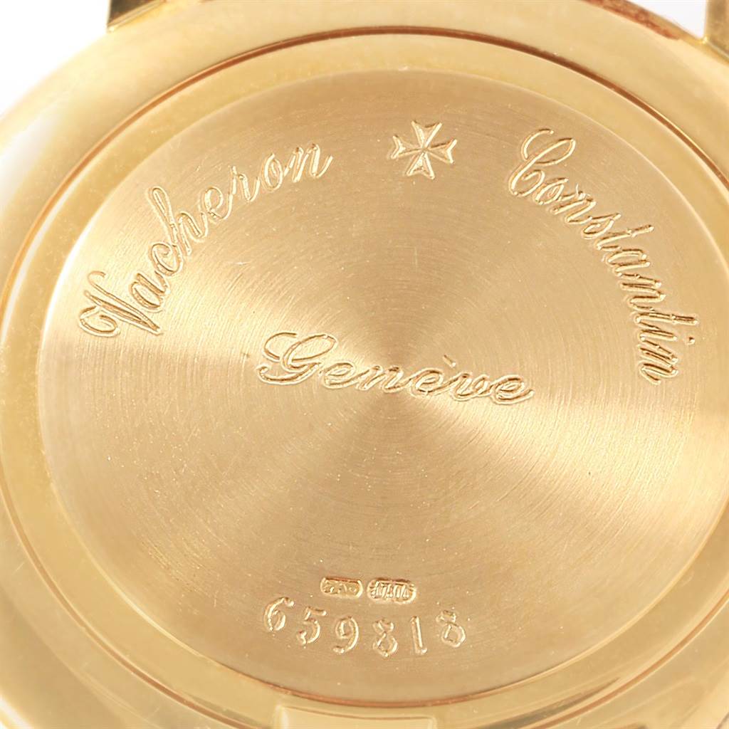 The image shows the case back of a Vacheron Constantin Patrimony 31160 Men
s Yellow Gold White Dial 31160 Men
s Yellow Gold White Dial watch, displaying branding and a serial number.