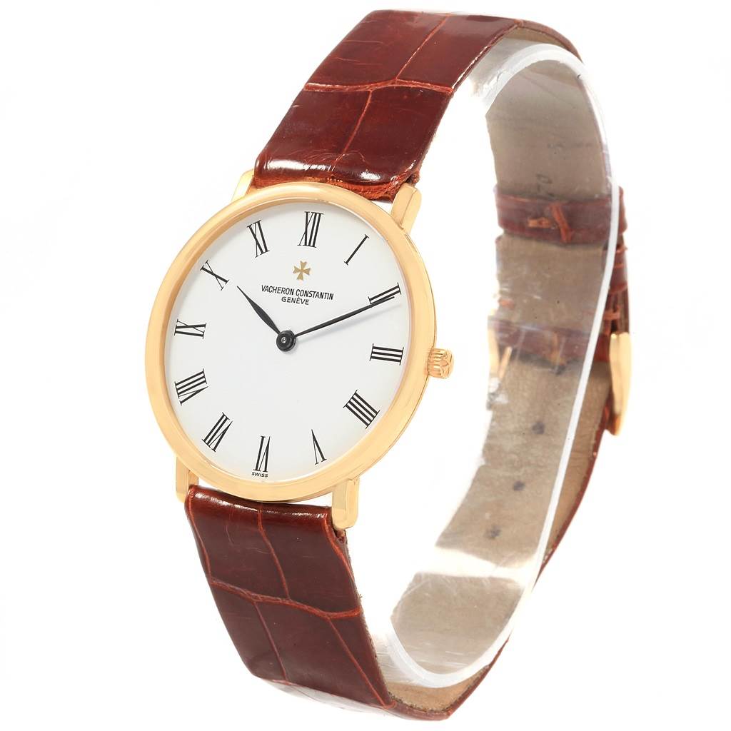 The image shows a Vacheron Constantin Patrimony 31160 Men
s Yellow Gold White Dial 31160 Men
s Yellow Gold White Dial watch from a front-right angle, highlighting its face, brown leather strap, and gold case.