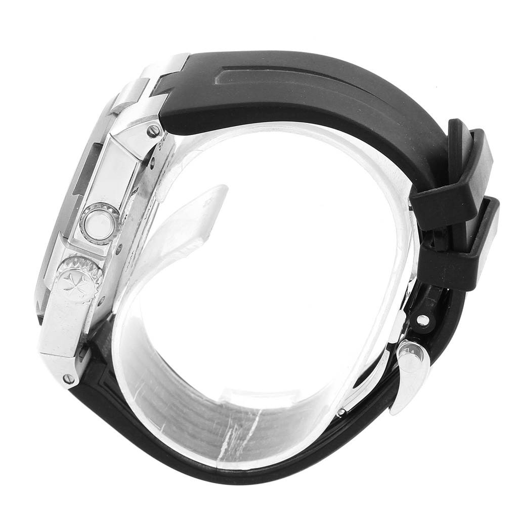 This image shows a side view of the Vacheron Constantin Overseas 47450/000W-9511 Men's Stainless Steel Grey Dial 47450/000W-9511 Men's Stainless Steel Grey Dial model, highlighting the watch case, crown, and black strap.