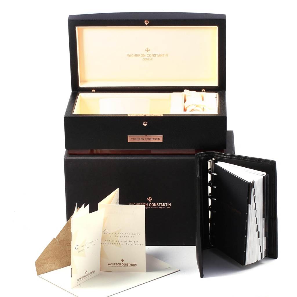 The image shows the Vacheron Constantin Overseas Men's Stainless Steel Silver Dial Men's Stainless Steel Silver Dial packaging box, certificates, and a booklet, displayed at an angle where the box lid is open.