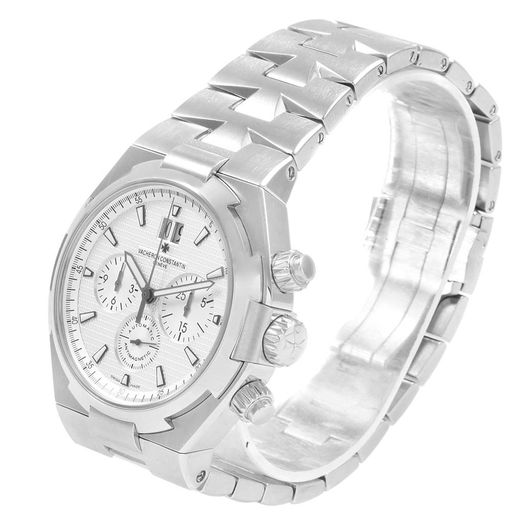 This image shows a side angle of the Vacheron Constantin Overseas Men's Stainless Steel Silver Dial Men's Stainless Steel Silver Dial watch, featuring its dial, crown, pushers, and bracelet.