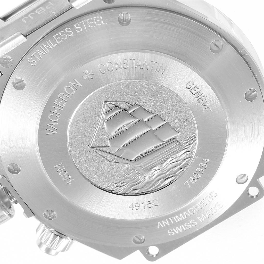 This image shows the back of a Vacheron Constantin Overseas Men's Stainless Steel Silver Dial Men's Stainless Steel Silver Dial model watch in stainless steel with an engraved ship design.