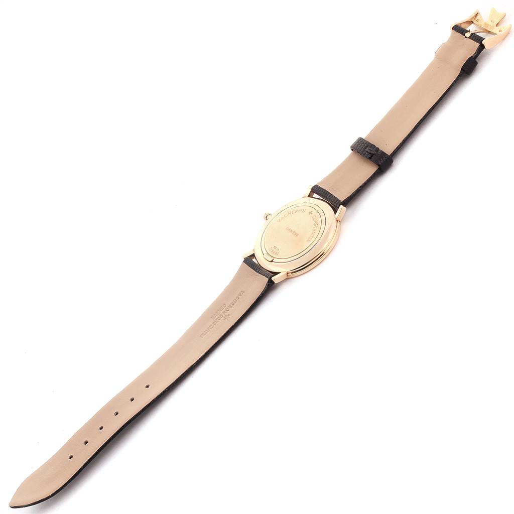 The image shows the back view of a Vacheron Constantin Patrimony 31160 Men's Yellow Gold White Dial 31160 Men's Yellow Gold White Dial watch, highlighting its case back and strap.