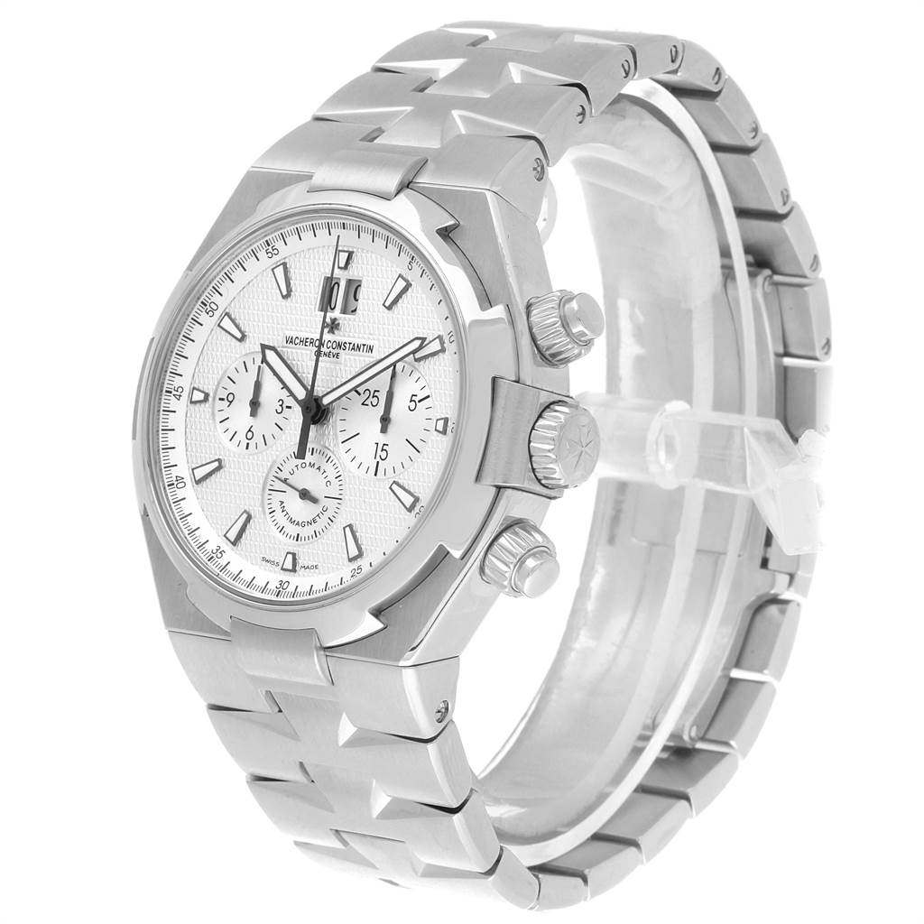 The Vacheron Constantin Overseas 49150 Men's Stainless Steel Silver Dial 49150 Men's Stainless Steel Silver Dial watch is shown at a three-quarter angle, displaying its dial, chronograph subdials, and metal bracelet.