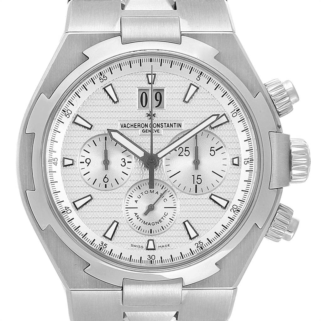 The image shows a front view of the Vacheron Constantin Overseas 49150 Men's Stainless Steel Silver Dial 49150 Men's Stainless Steel Silver Dial watch, highlighting the dial, subdials, and push buttons.