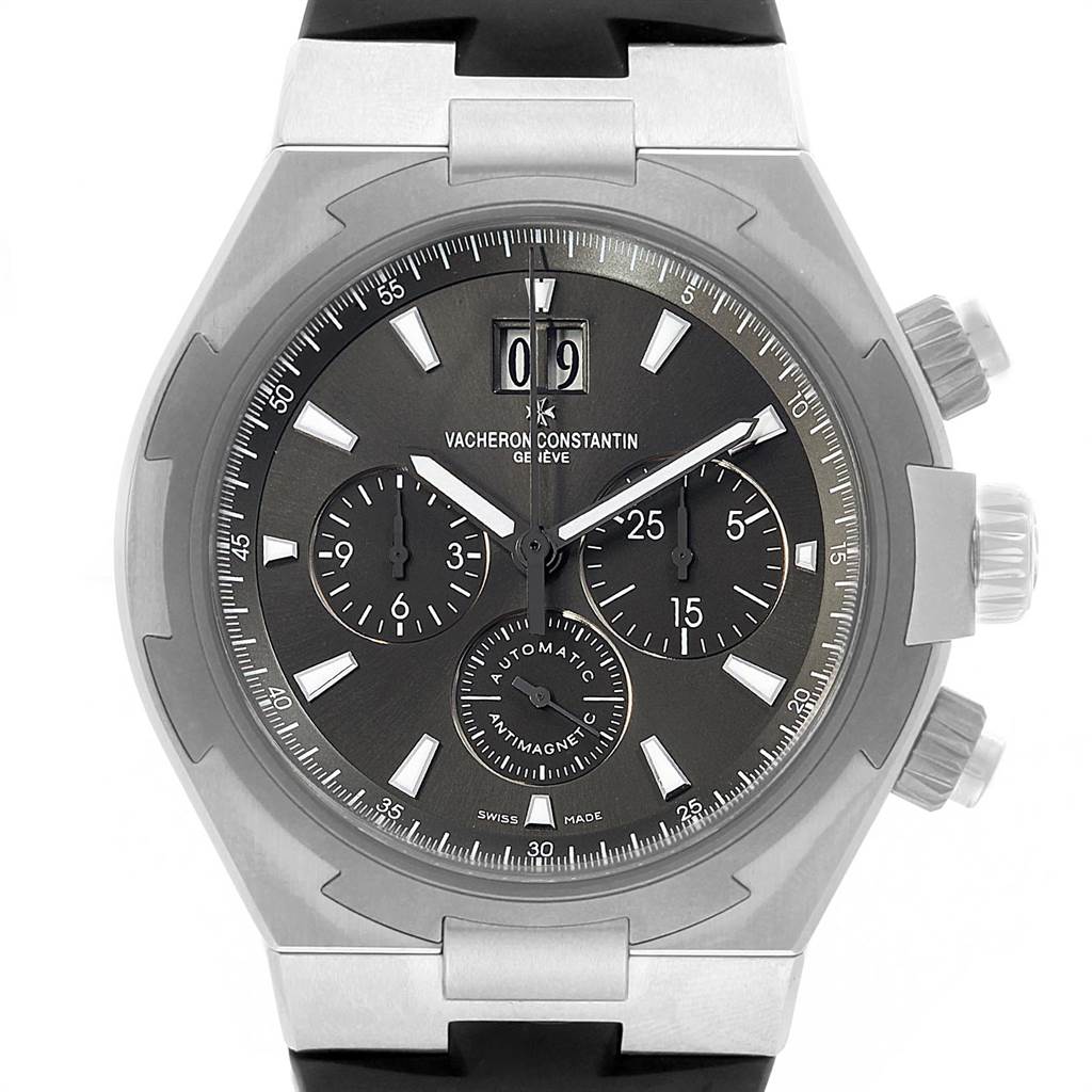 The Vacheron Constantin Overseas VACHERON CONSTANTIN Men's Stainless Steel Grey Dial VACHERON CONSTANTIN Men's Stainless Steel Grey Dial model watch is shown from a front angle, displaying its dial, chronograph sub-dials, and crown.