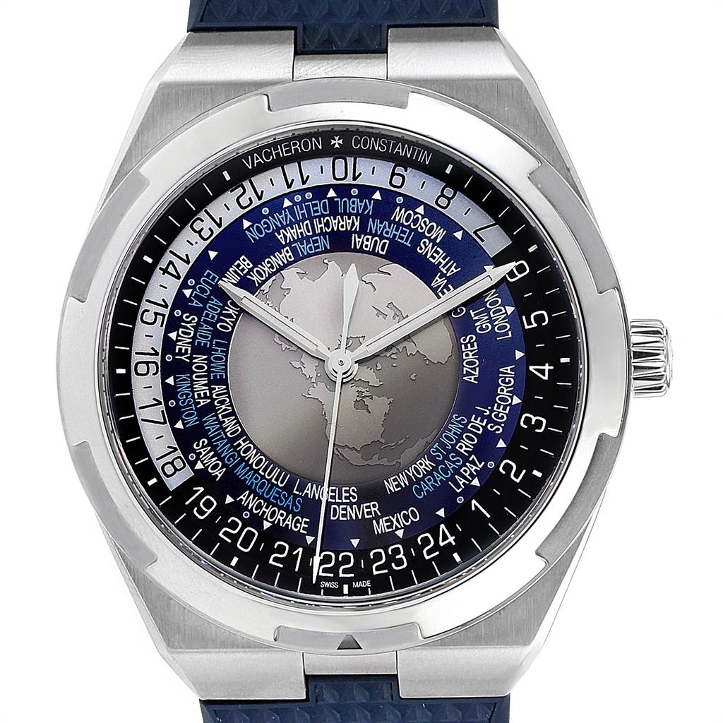 The image shows the face and bezel of the Vacheron Constantin Overseas 7700V/110A-B172 Men's Stainless Steel Blue Dial 7700V/110A-B172 Men's Stainless Steel Blue Dial watch, highlighting its world time display and crown.