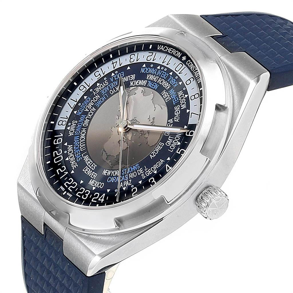 The image shows a Vacheron Constantin Overseas 7700V/110A-B172 Men's Stainless Steel Blue Dial 7700V/110A-B172 Men's Stainless Steel Blue Dial watch at an angle highlighting the face, crown, and part of the blue strap.