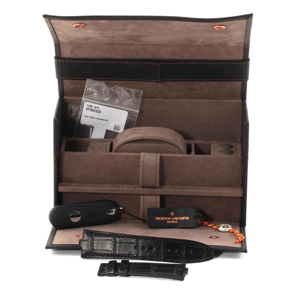 This image shows a Vacheron Constantin Overseas 7700V/110A-B172 Men's Stainless Steel Blue Dial 7700V/110A-B172 Men's Stainless Steel Blue Dial watch case, a warranty card, a screwdriver, and additional straps from a front angle.