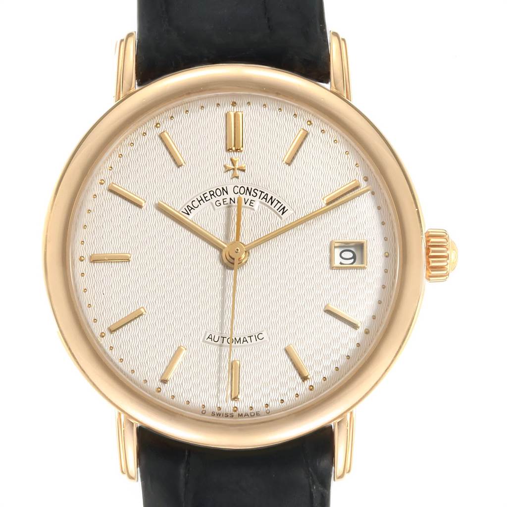 The image shows a front view of a Vintage Vacheron Constantin watch, displaying the dial, hands, date window, and crown.