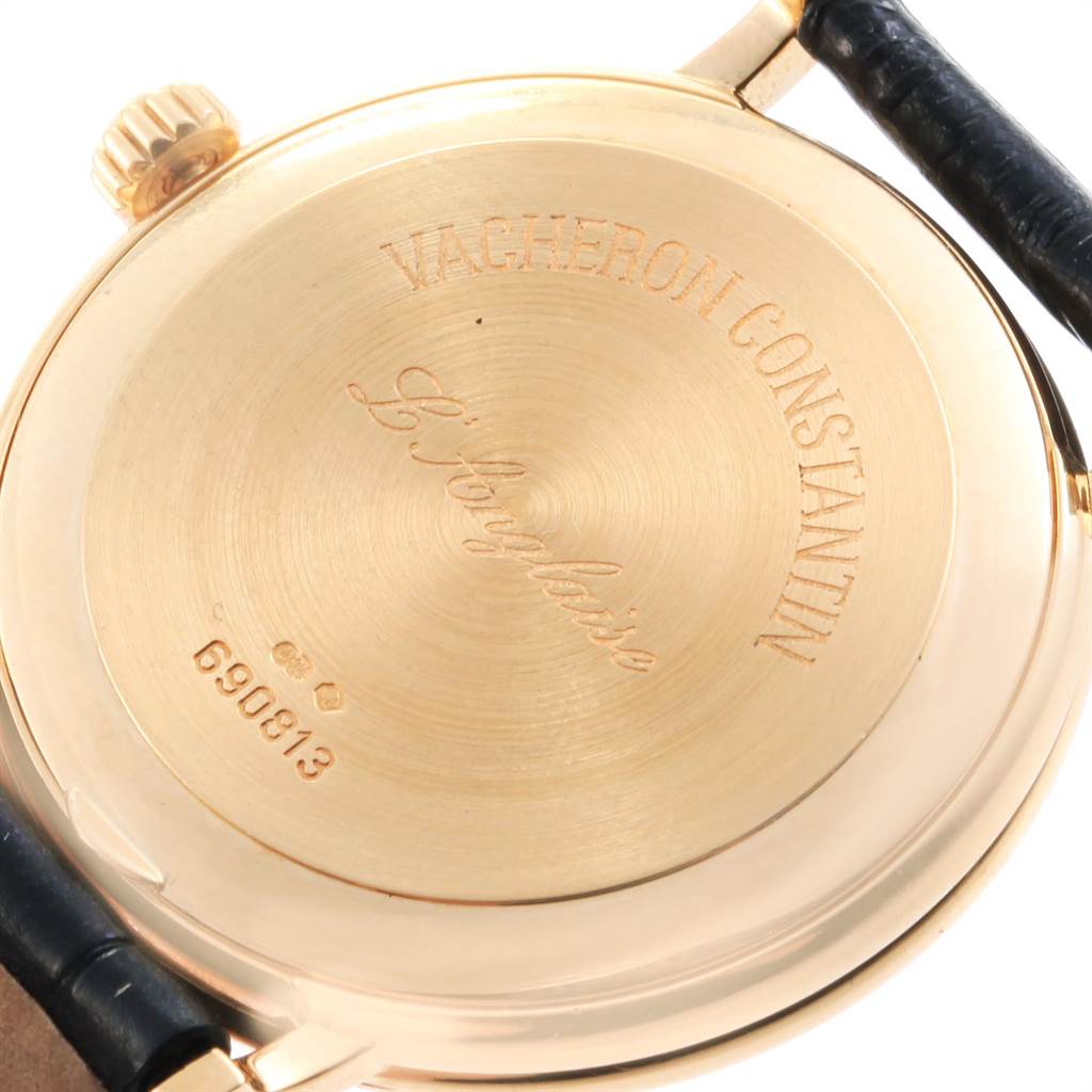 The image shows the back case of a Vintage Vacheron Constantin watch, displaying the brand name and serial number.